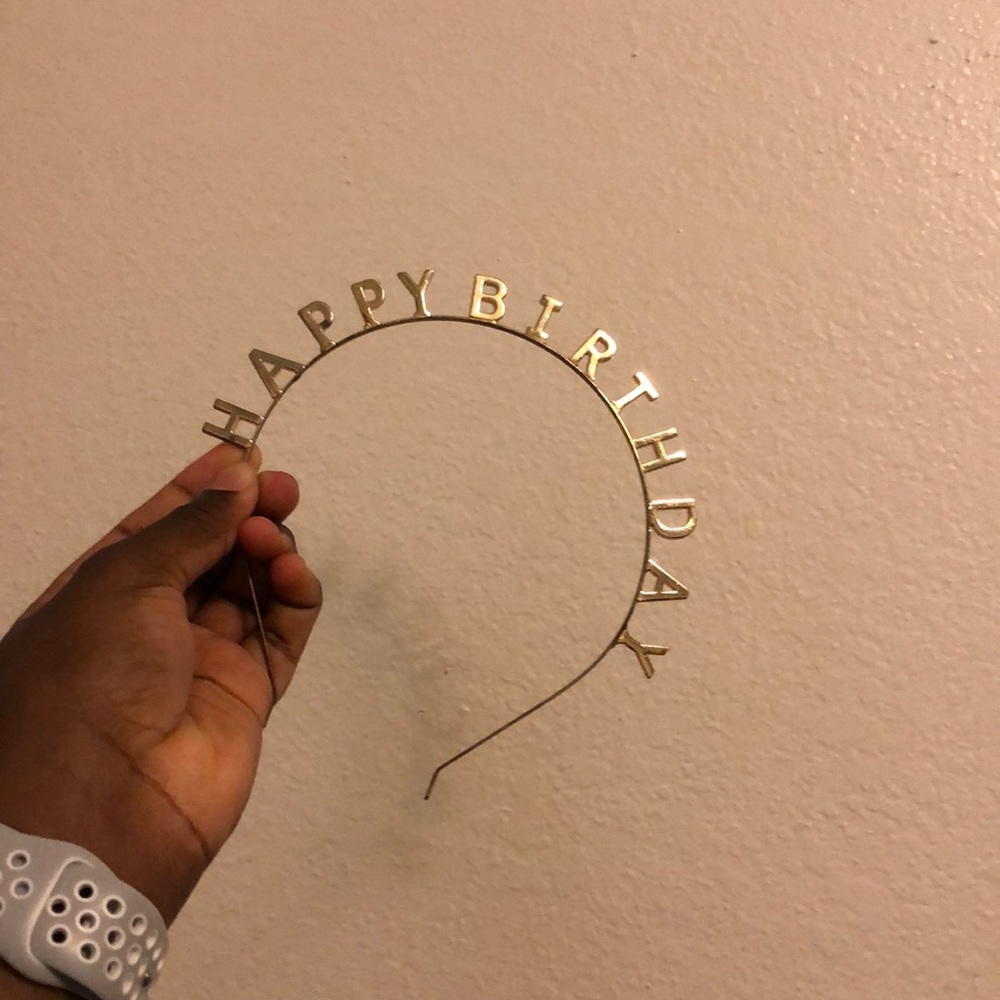 Metal headband that says “HAPPY BIRTHDAY”